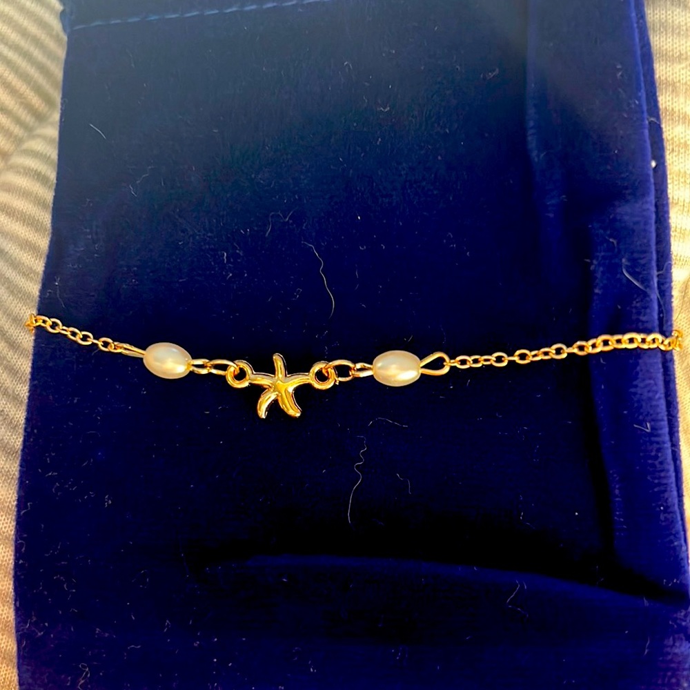 Gold colored anklet
